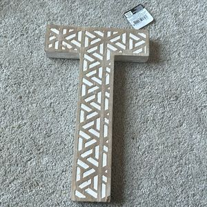 Michael’s oversized letter T